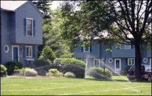 Sprinklers watering the lawn at a condominium complex
