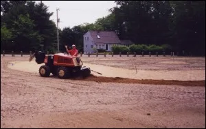 Tractor working a ball field infield